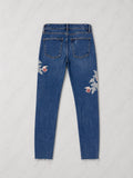 ג׳ינס כחול עם רקמת פרחים Zara Woman