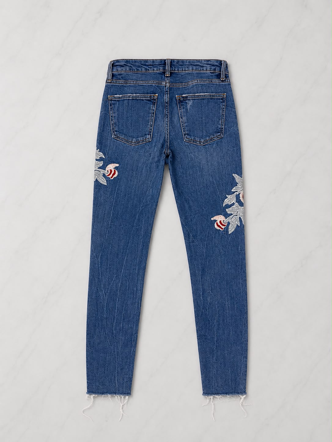 ג׳ינס כחול עם רקמת פרחים Zara Woman
